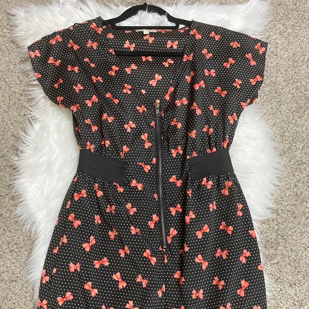 Black and orange bow tie dress. Zipper in front